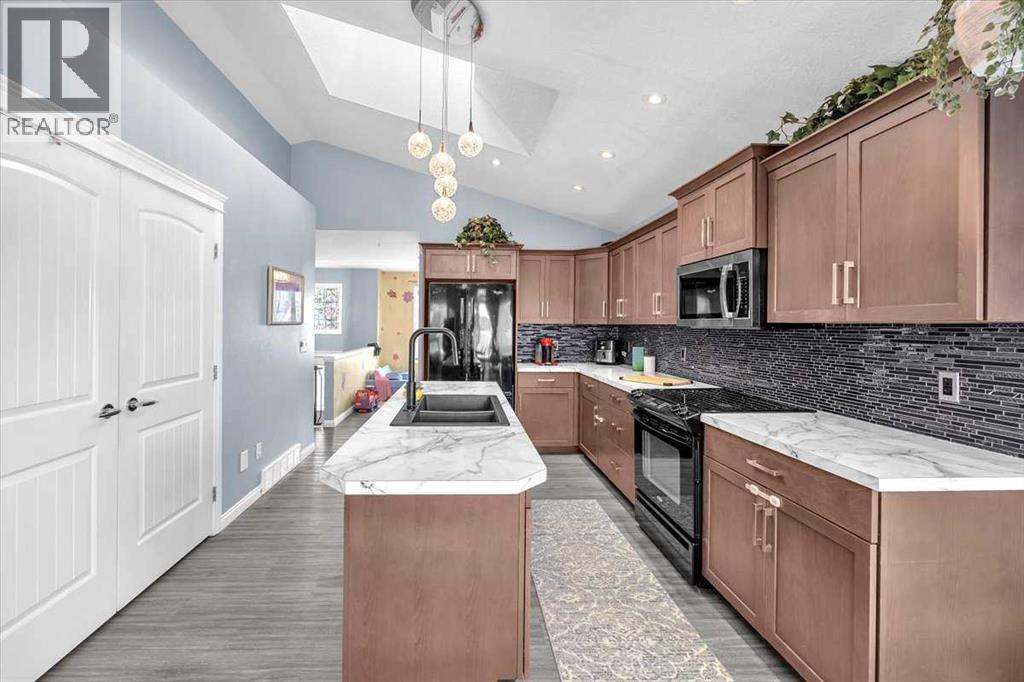 301 Mcleod Crescent, Diamond Valley, Alberta  T0L 2A0 - Photo 6 - A2290530