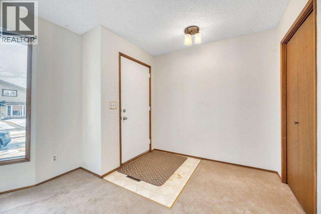 56 Cedarwood Hill Sw, Calgary, Alberta  T2W 3H5 - Photo 7 - A2291326