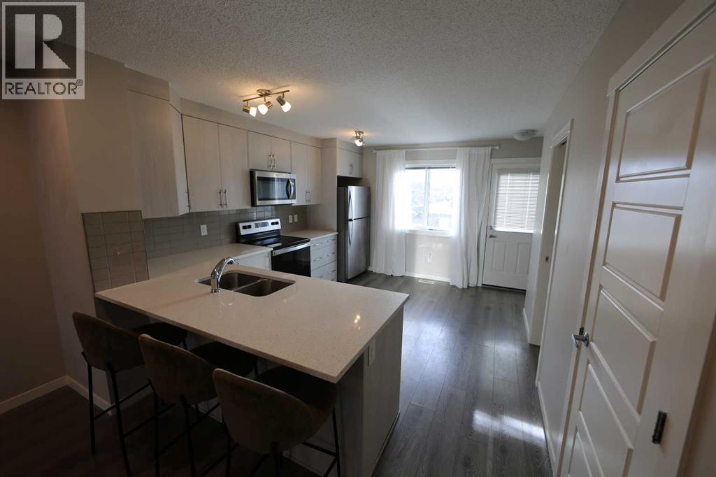 1512, 7451 Falconridge Boulevard NE, Calgary, Alberta  T3J 0Z8 - Photo 7 - A2281349