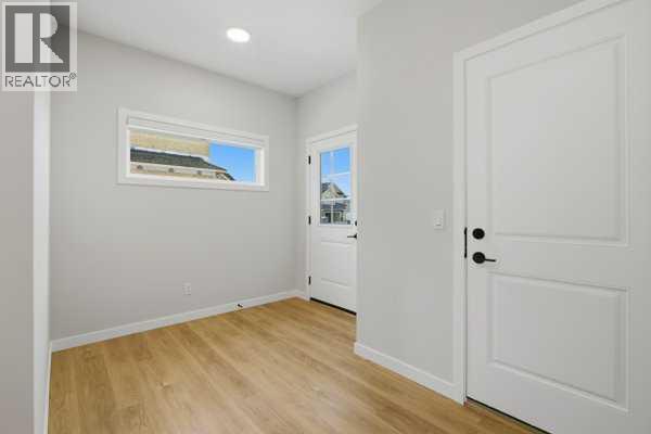 9 Bayview Mews SW, Airdrie, Alberta  T4B 5P1 - Photo 7 - A2293386