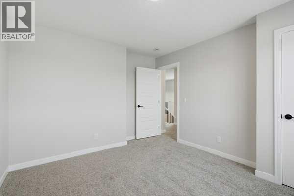 9 Bayview Mews SW, Airdrie, Alberta  T4B 5P1 - Photo 33 - A2293386