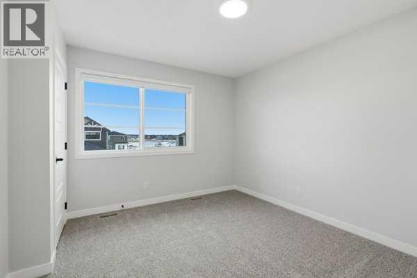 9 Bayview Mews SW, Airdrie, Alberta  T4B 5P1 - Photo 32 - A2293386