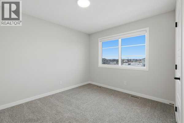 9 Bayview Mews SW, Airdrie, Alberta  T4B 5P1 - Photo 31 - A2293386