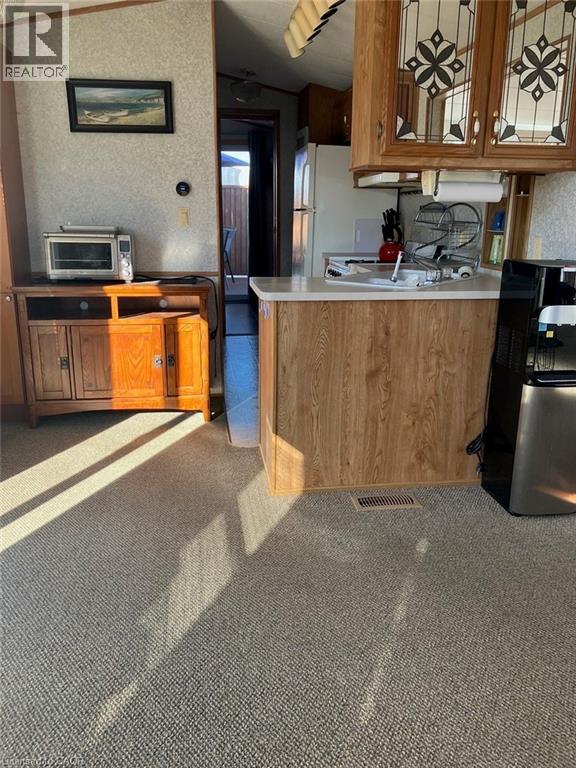 92 Clubhouse Road Unit# 29, Turkey Point, Ontario  N0E 1T0 - Photo 2 - 40813401