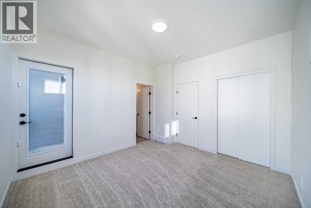 828 Arbour Lake Road NW, Calgary, Alberta  T3G 0H6 - Photo 11 - A2261977