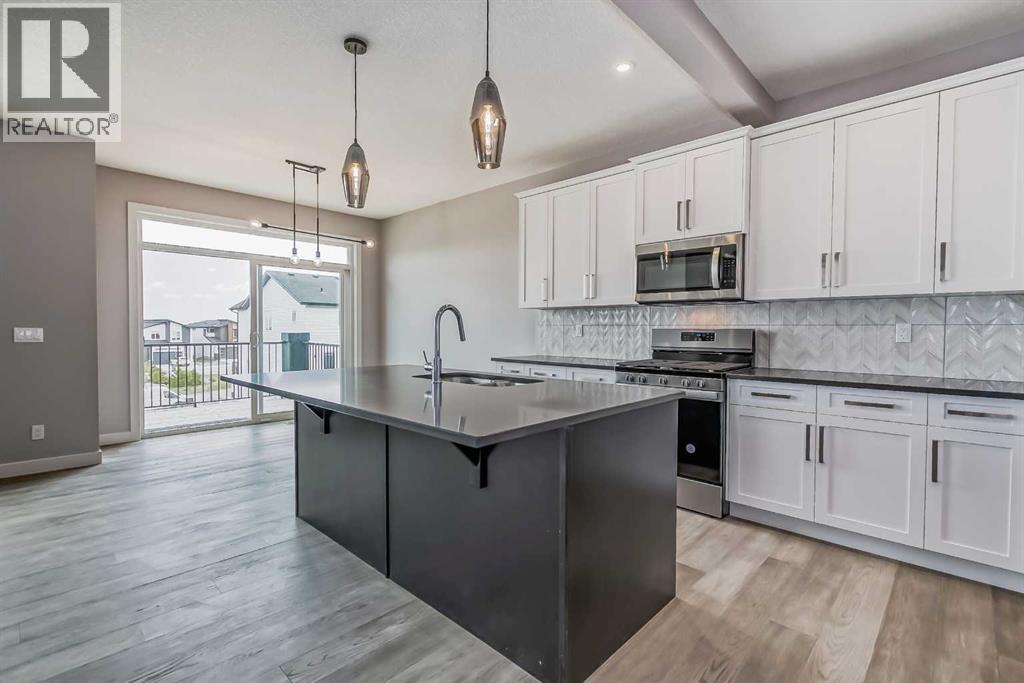 4 Topaz Place, Cochrane, Alberta  T4C 3K2 - Photo 7 - A2283463