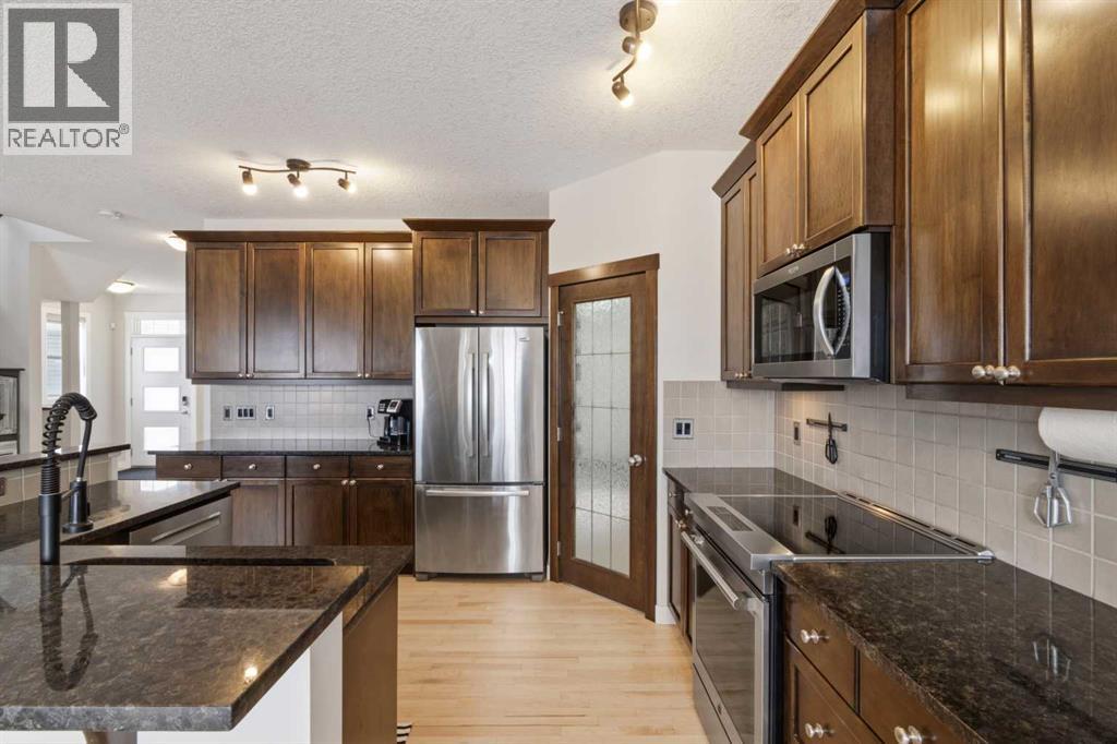 48 Heritage Green, Cochrane, Alberta  T4C 0L3 - Photo 12 - A2291764