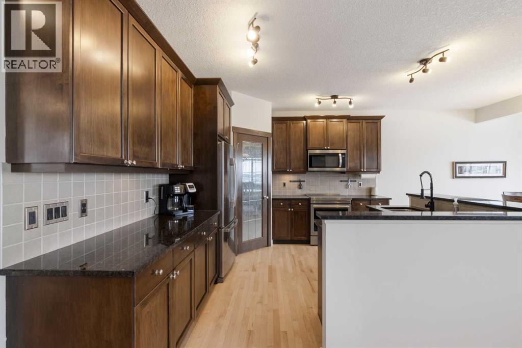 48 Heritage Green, Cochrane, Alberta  T4C 0L3 - Photo 9 - A2291764