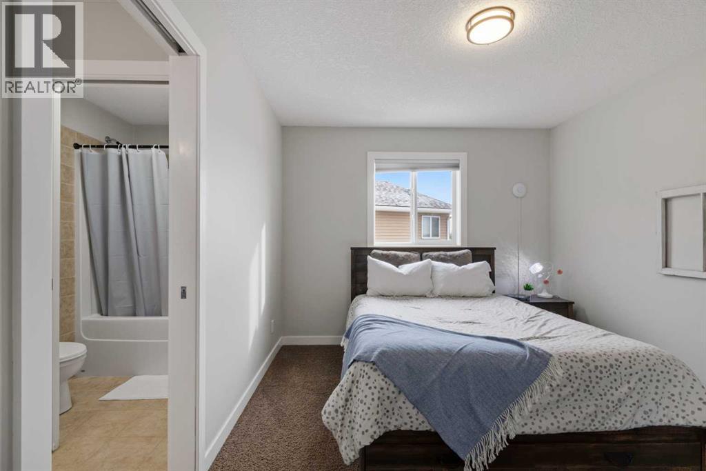 48 Heritage Green, Cochrane, Alberta  T4C 0L3 - Photo 22 - A2291764