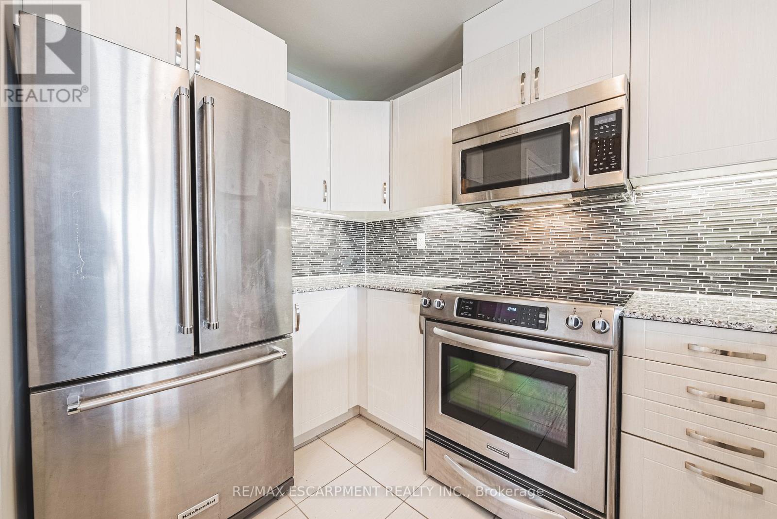 13-04 - 2420 Baronwood Drive, Oakville (Wm Westmount), Ontario  L6M 0X6 - Photo 9 - W12898646