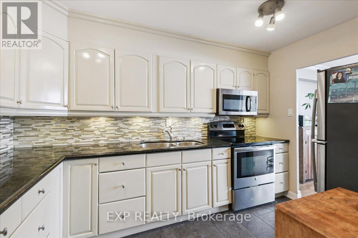 412 - 44 Longbourne Drive, Toronto (Willowridge-Martingrove-Richview), Ontario  M9R 2M7 - Photo 3 - W12840086