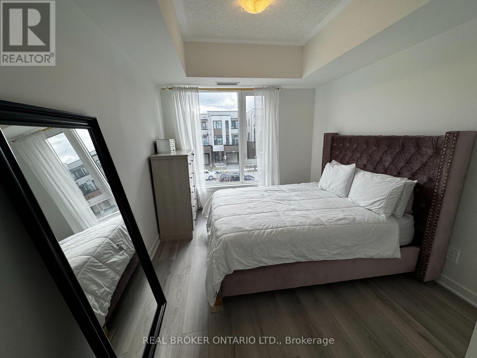 205 - 1440 Clarriage Court, Milton (Fo Ford), Ontario  L9E 1B3 - Photo 6 - W12862898