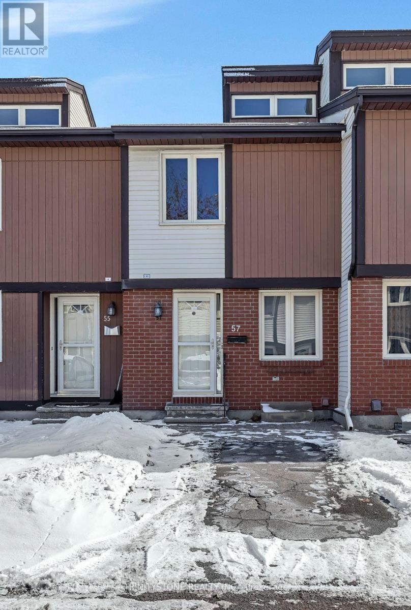 Set in a highly desirable location just off Carling Avenue, this beautifully maintained 3-bedroom, 2-bathroom condo offers an exceptional blend of comfort, style, and convenience-just moments from shopping, schools, and everyday amenities.From the moment you enter, you're welcomed by a bright and inviting foyer that flows seamlessly into a versatile nook, ideal for a refined home office or intimate dining space. The thoughtfully designed kitchen is both functional and stylish, featuring ample cabinetry and quality appliances to meet all your culinary needs.The main living area exudes warmth and sophistication, highlighted by a cozy fireplace and abundant natural light. Patio doors lead to your private outdoor retreat, creating a seamless indoor-outdoor living experience.Upstairs, the spacious primary suite offers a peaceful escape, complemented by two additional well-proportioned bedrooms and a beautifully updated 4-piece bathroom with modern finishes.The fully finished lower level expands your living space with a generous recreation room-perfect for entertaining, relaxing, or creating a personalized media or games area-along with a convenient 2-piece bath and dedicated laundry area.Step outside to enjoy your private, partially fenced backyard-an inviting setting for summer evenings and quiet relaxation.Whether you're a first-time buyer, investor, or looking to downsize without compromise, this residence presents a refined opportunity to enjoy low-maintenance living in an unbeatable location. (id:48254)