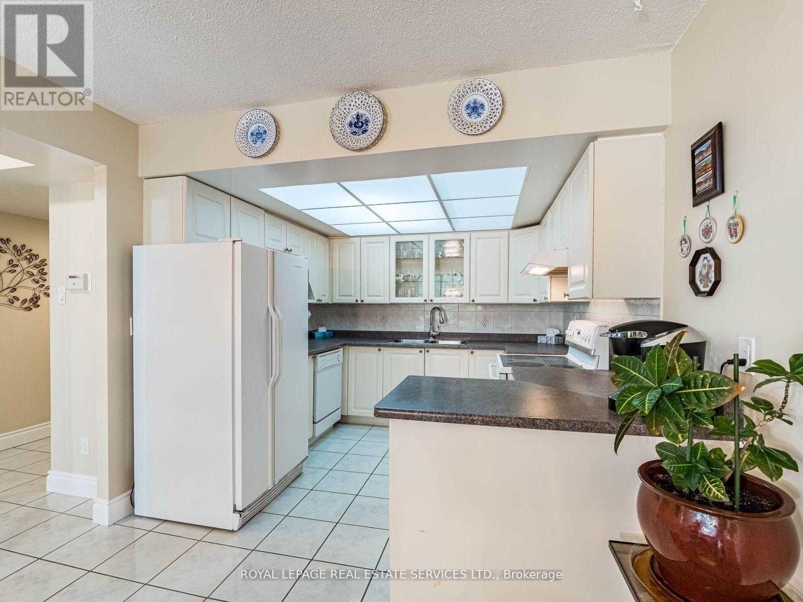 #202 - 310 Mill Street S, Brampton, Ontario  L6Y 3B1 - Photo 17 - W12899906