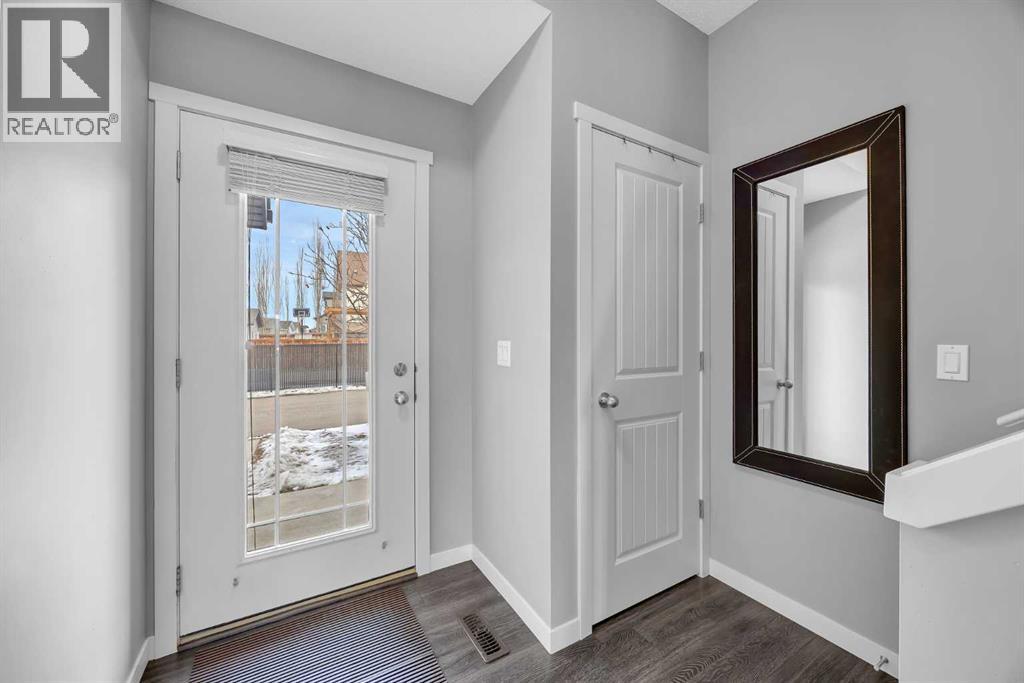 15 Copperpond Landing Se, Calgary, Alberta  T2Z 1G6 - Photo 4 - A2288713