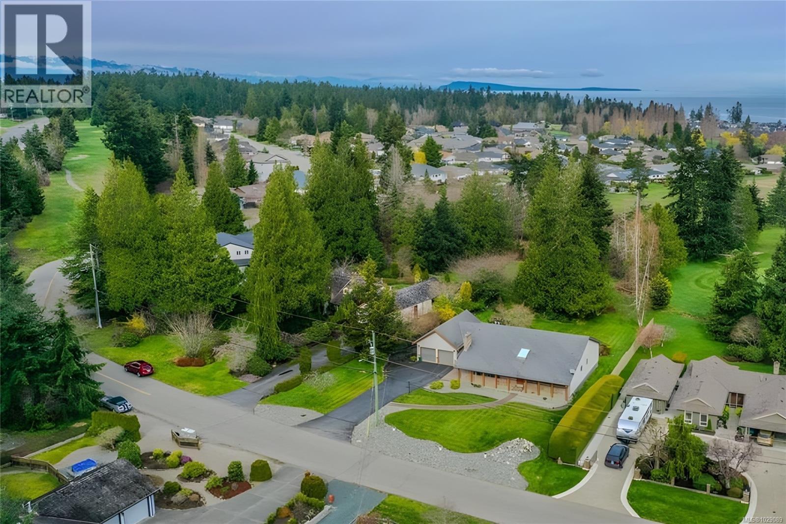 1023 Harlequin Rd, Qualicum Beach, British Columbia  V9K 1E2 - Photo 1 - 1029089