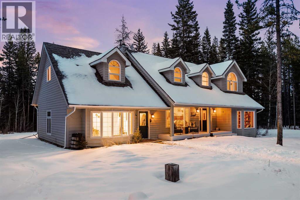 328 Wild Rose Close, Rural Rocky View County, Alberta  T3Z 3R3 - Photo 2 - A2287872