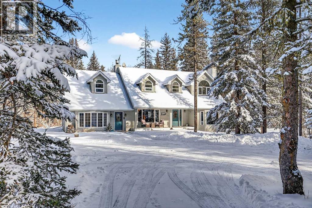 328 Wild Rose Close, Rural Rocky View County, Alberta  T3Z 3R3 - Photo 4 - A2287872