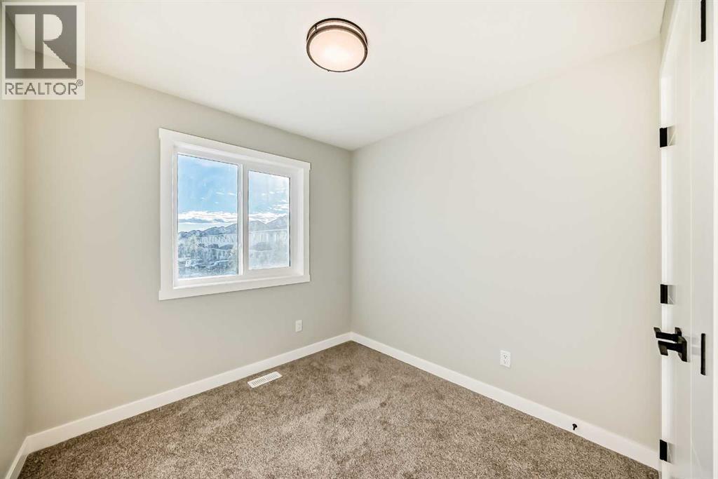 703 Clover Road, Carstairs, Alberta  T0M 0N0 - Photo 32 - A2278310