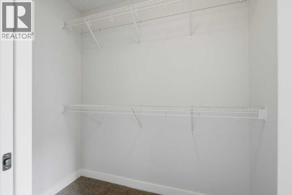 311 Wolf Creek Way Se, Calgary, Alberta  T2X 4Y8 - Photo 30 - A2290796