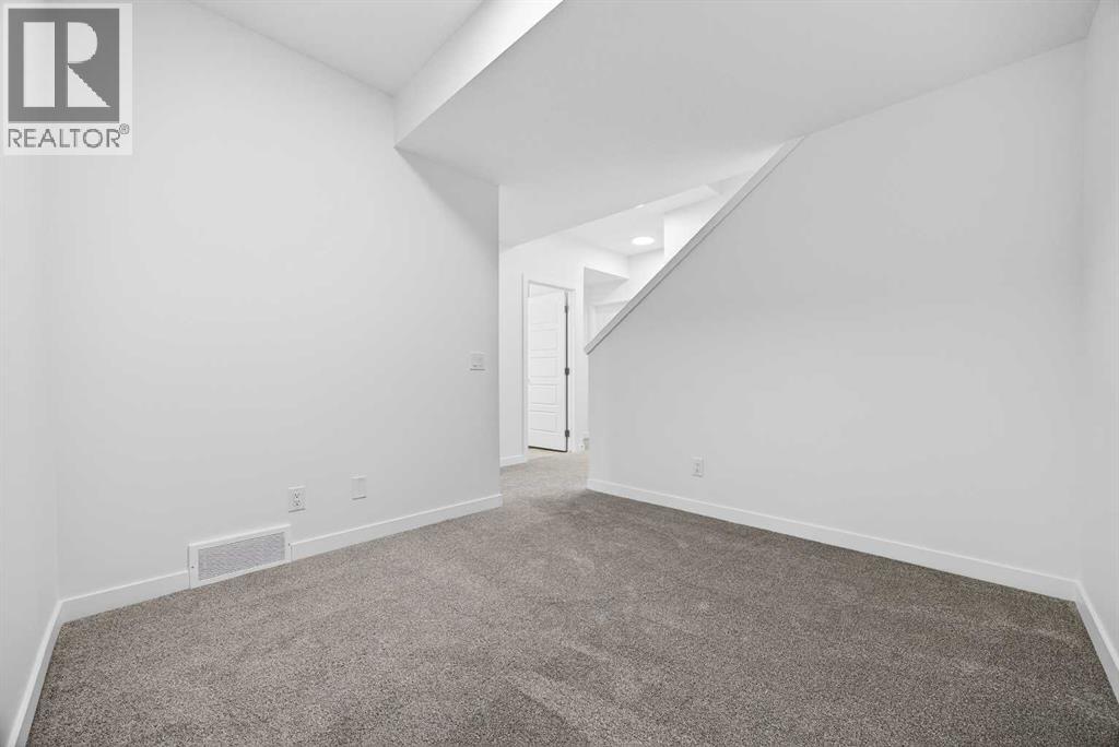 58 Creekside Way SW, Calgary, Alberta  T2X 6E2 - Photo 32 - A2292907