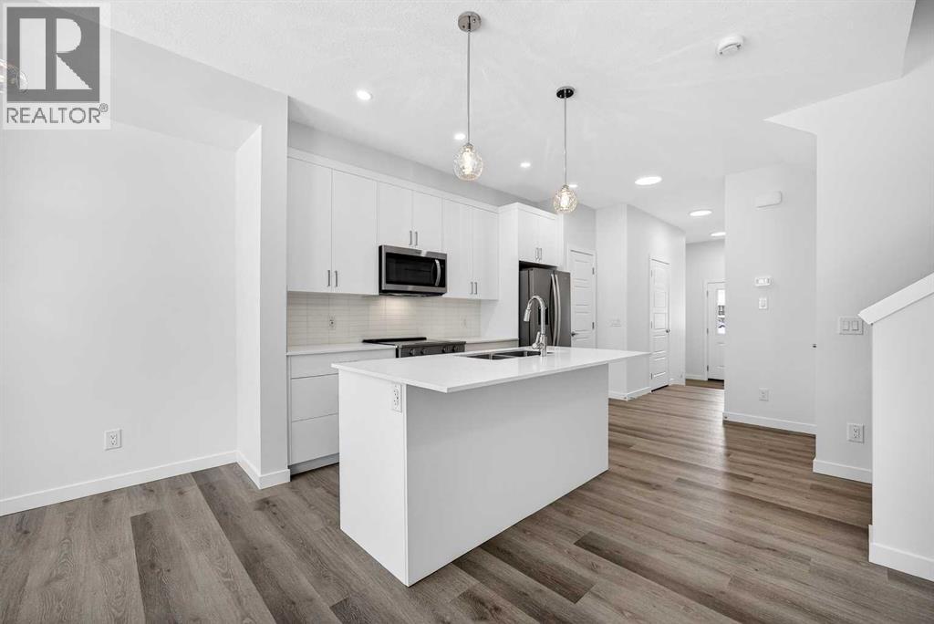 58 Creekside Way SW, Calgary, Alberta  T2X 6E2 - Photo 8 - A2292907