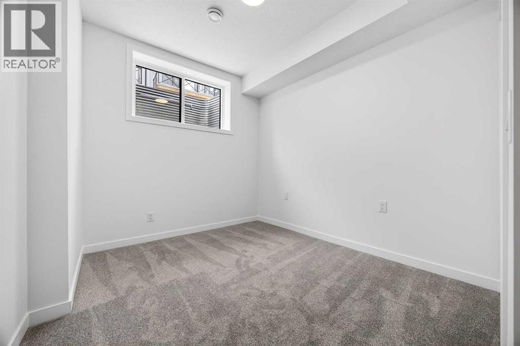 58 Creekside Way SW, Calgary, Alberta  T2X 6E2 - Photo 33 - A2292907