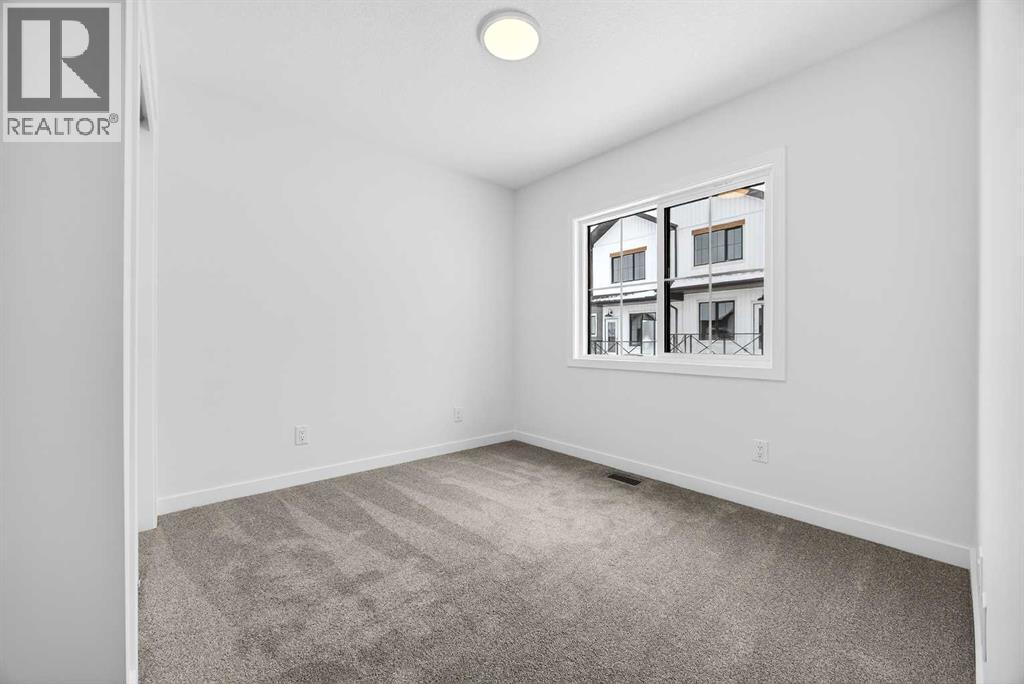 58 Creekside Way SW, Calgary, Alberta  T2X 6E2 - Photo 26 - A2292907