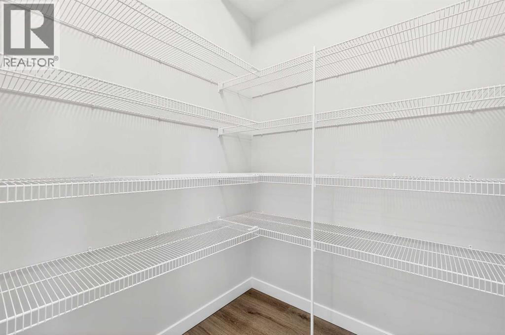 104, 40 Creekside Way SW, Calgary, Alberta  T2X 6E2 - Photo 18 - A2292926