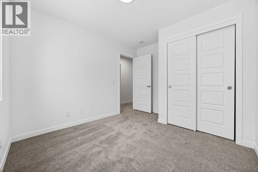 58 Creekside Way SW, Calgary, Alberta  T2X 6E2 - Photo 27 - A2292907