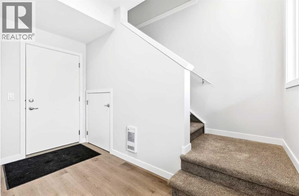 104, 40 Creekside Way SW, Calgary, Alberta  T2X 6E2 - Photo 7 - A2292926