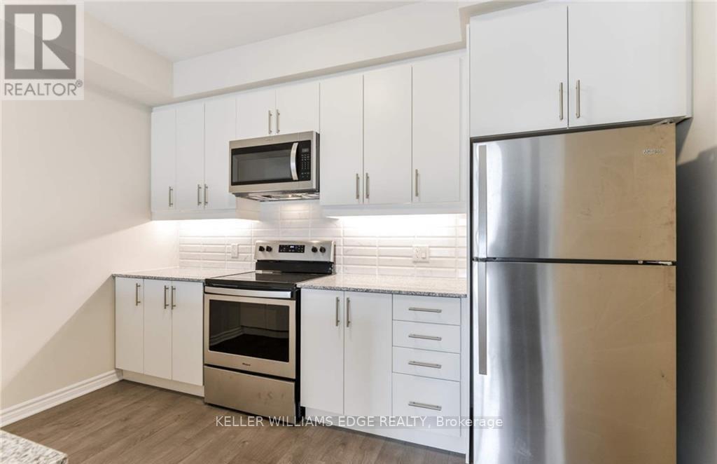 320 - 150 Oak Park Boulevard, Oakville, Ontario  L6H 3P2 - Photo 11 - W12898832