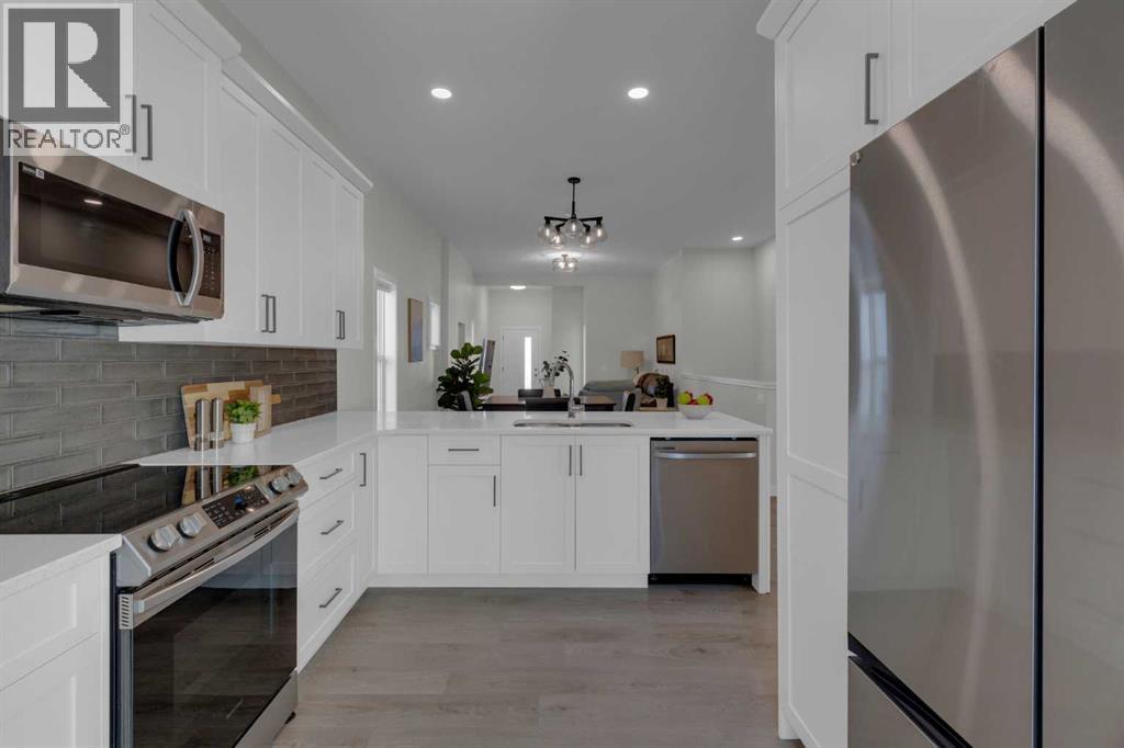 812 Reynolds Manor SW, Airdrie, Alberta  T4B 5G2 - Photo 8 - A2287244