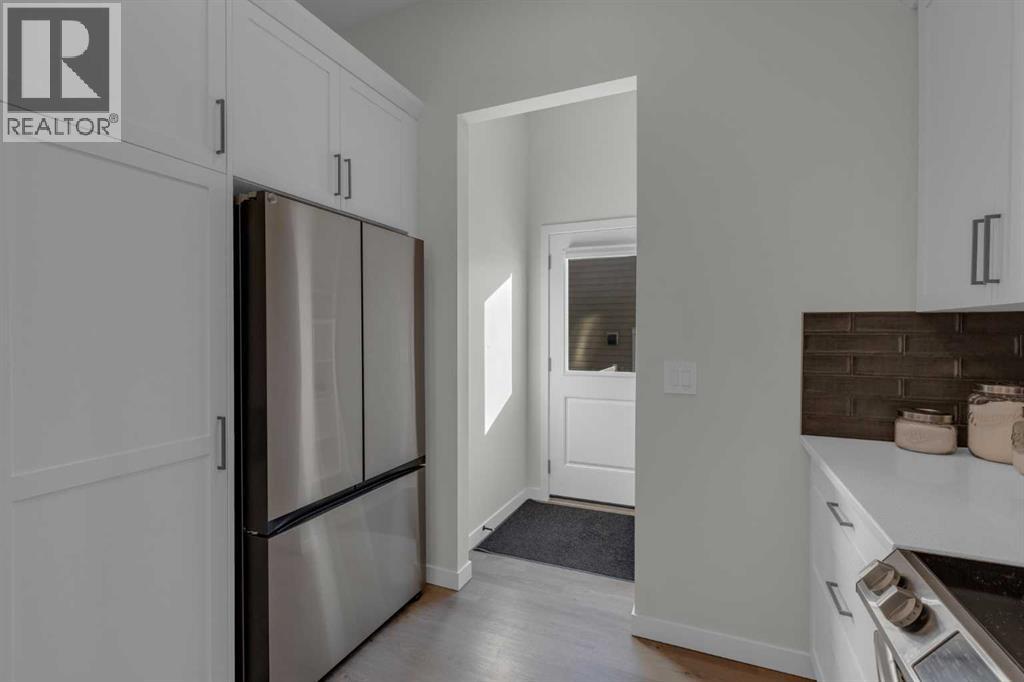 812 Reynolds Manor SW, Airdrie, Alberta  T4B 5G2 - Photo 9 - A2287244