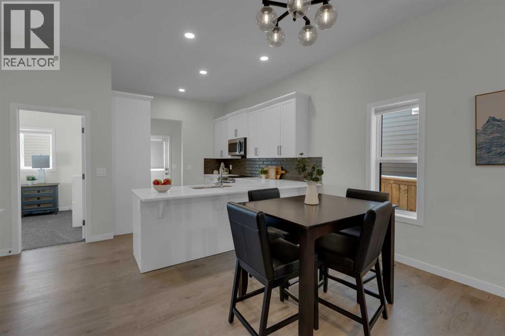 812 Reynolds Manor SW, Airdrie, Alberta  T4B 5G2 - Photo 5 - A2287244