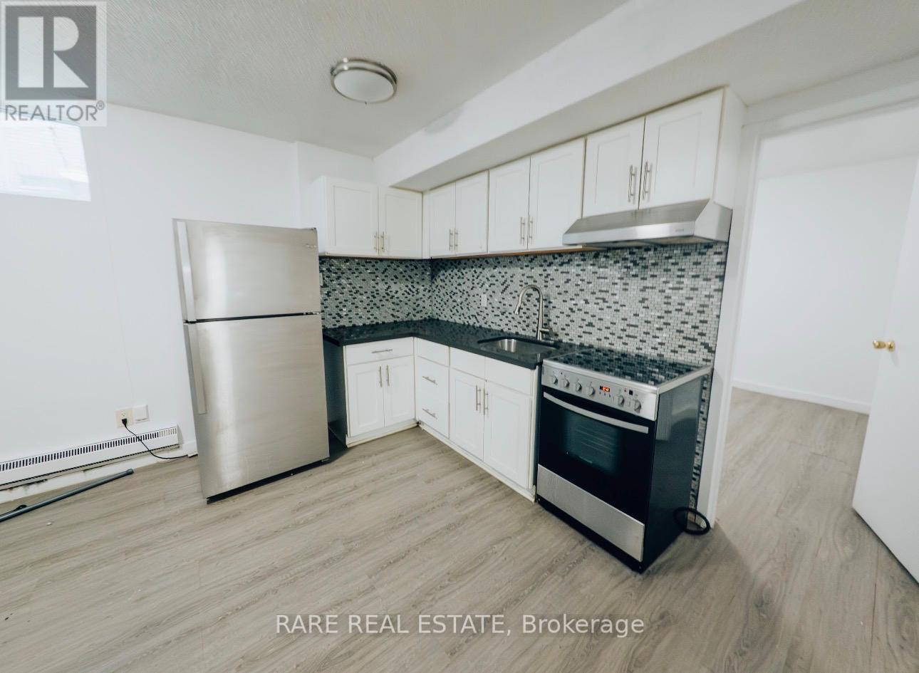 1 - 120 Spencer Avenue, Toronto, Ontario  M6K 2J6 - Photo 2 - W12800578