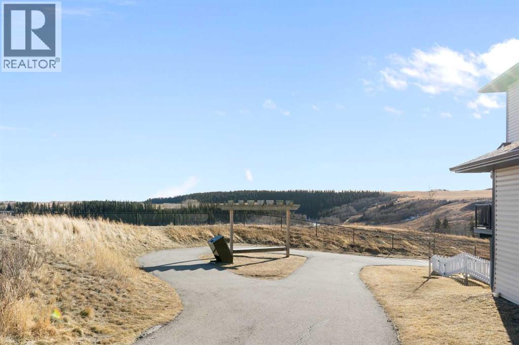 1403 Jumping Pound Common, Cochrane, Alberta  T4C 2L1 - Photo 30 - A2285401