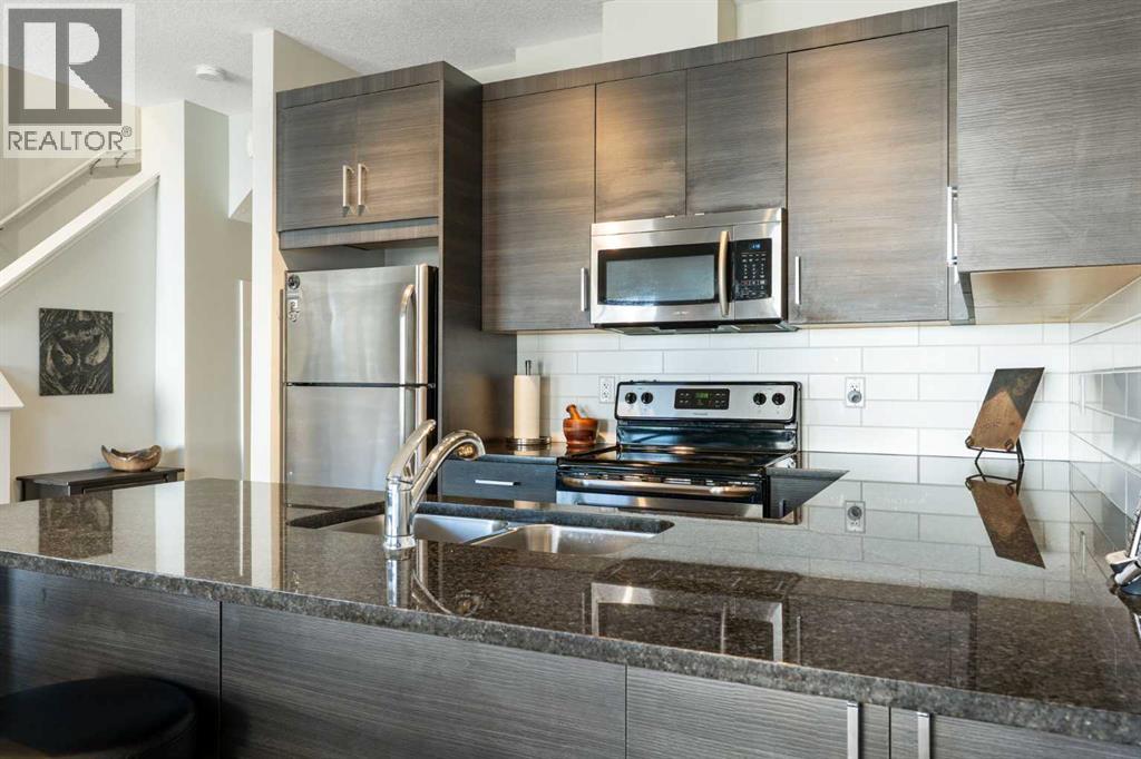 1403 Jumping Pound Common, Cochrane, Alberta  T4C 2L1 - Photo 9 - A2285401