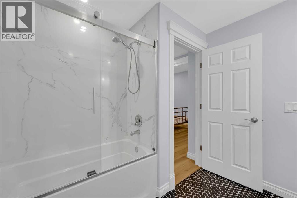 97 Strathridge Close Sw, Calgary, Alberta  T3H 4J3 - Photo 43 - A2294102