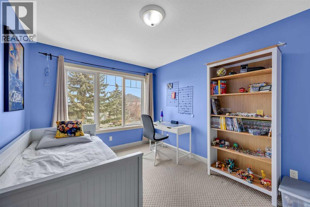 97 Strathridge Close Sw, Calgary, Alberta  T3H 4J3 - Photo 30 - A2294102