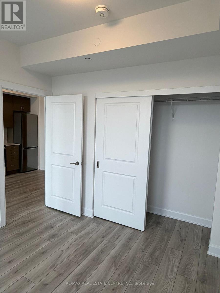 1207 - 3240 William Coltson Avenue, Oakville (Oa Rural Oakville), Ontario  L6H 8C8 - Photo 22 - W12697828