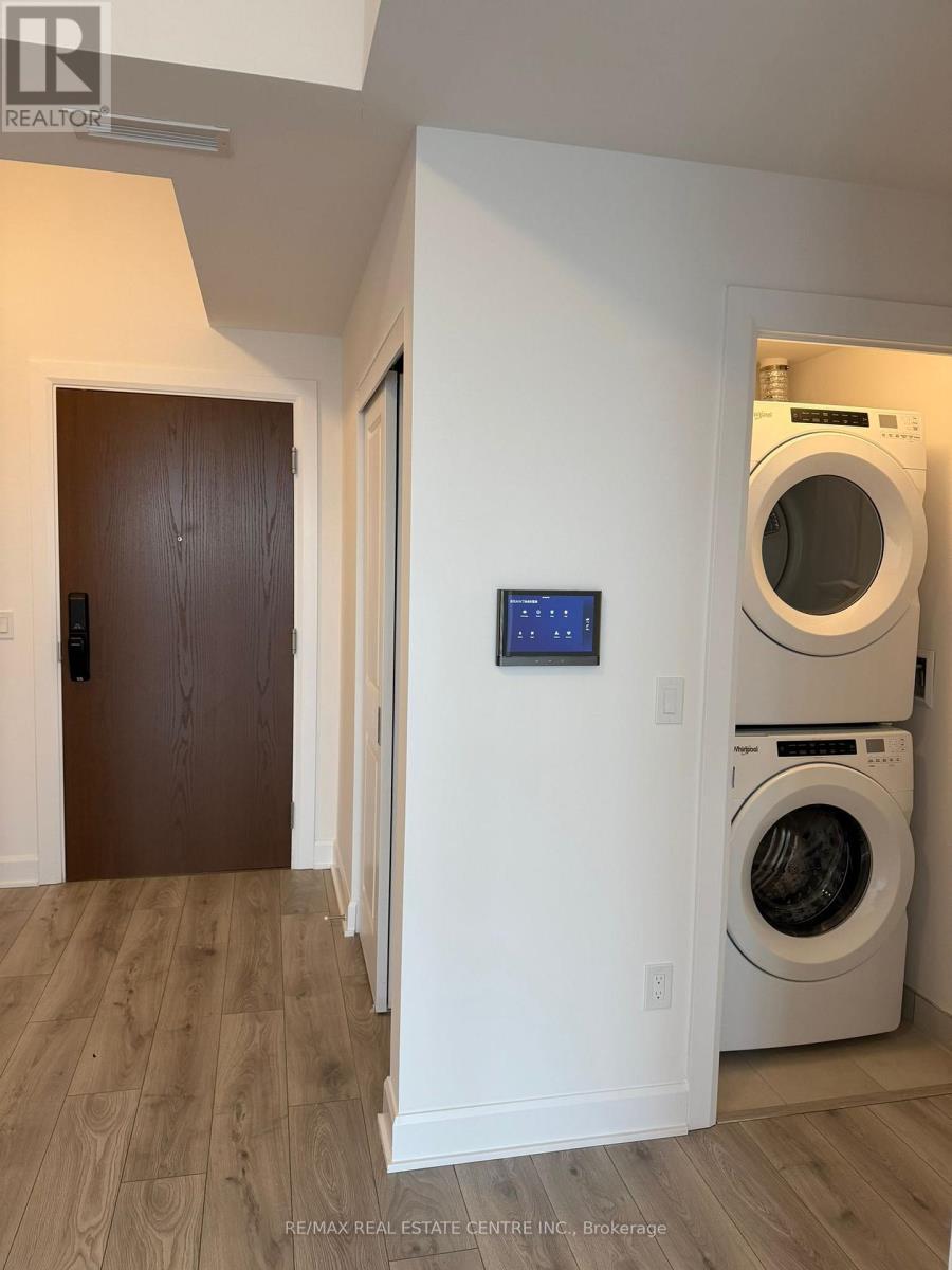 1207 - 3240 William Coltson Avenue, Oakville (Oa Rural Oakville), Ontario  L6H 8C8 - Photo 8 - W12697828