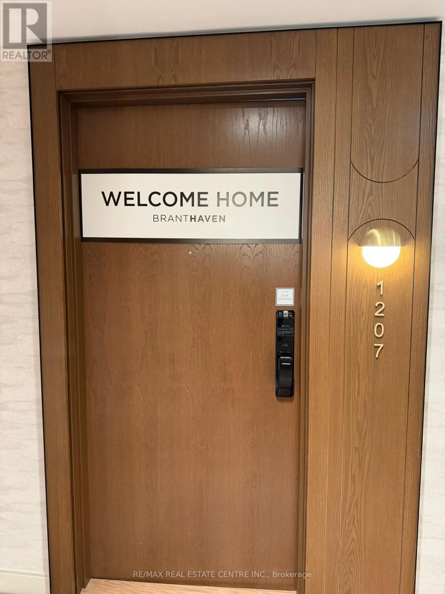 1207 - 3240 William Coltson Avenue, Oakville (Oa Rural Oakville), Ontario  L6H 8C8 - Photo 2 - W12697828