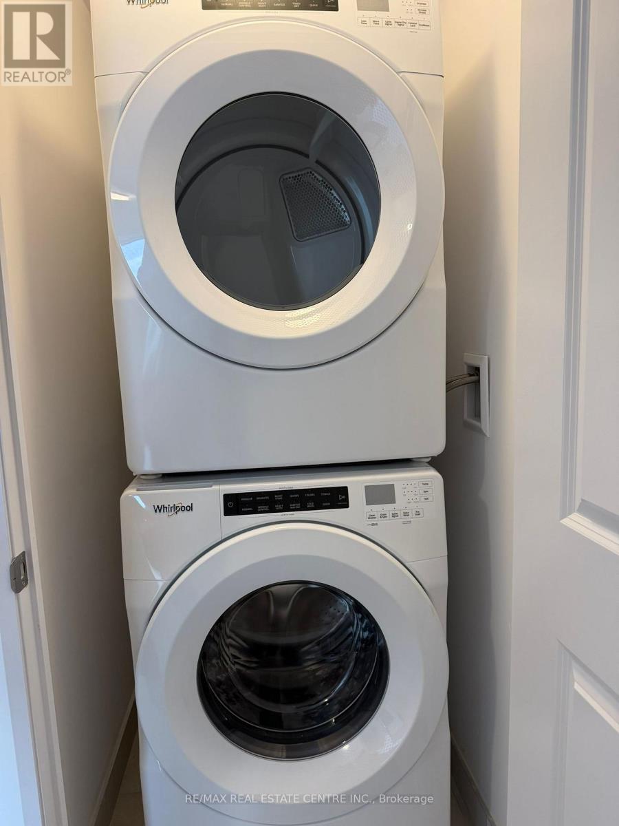 1207 - 3240 William Coltson Avenue, Oakville (Oa Rural Oakville), Ontario  L6H 8C8 - Photo 6 - W12697828