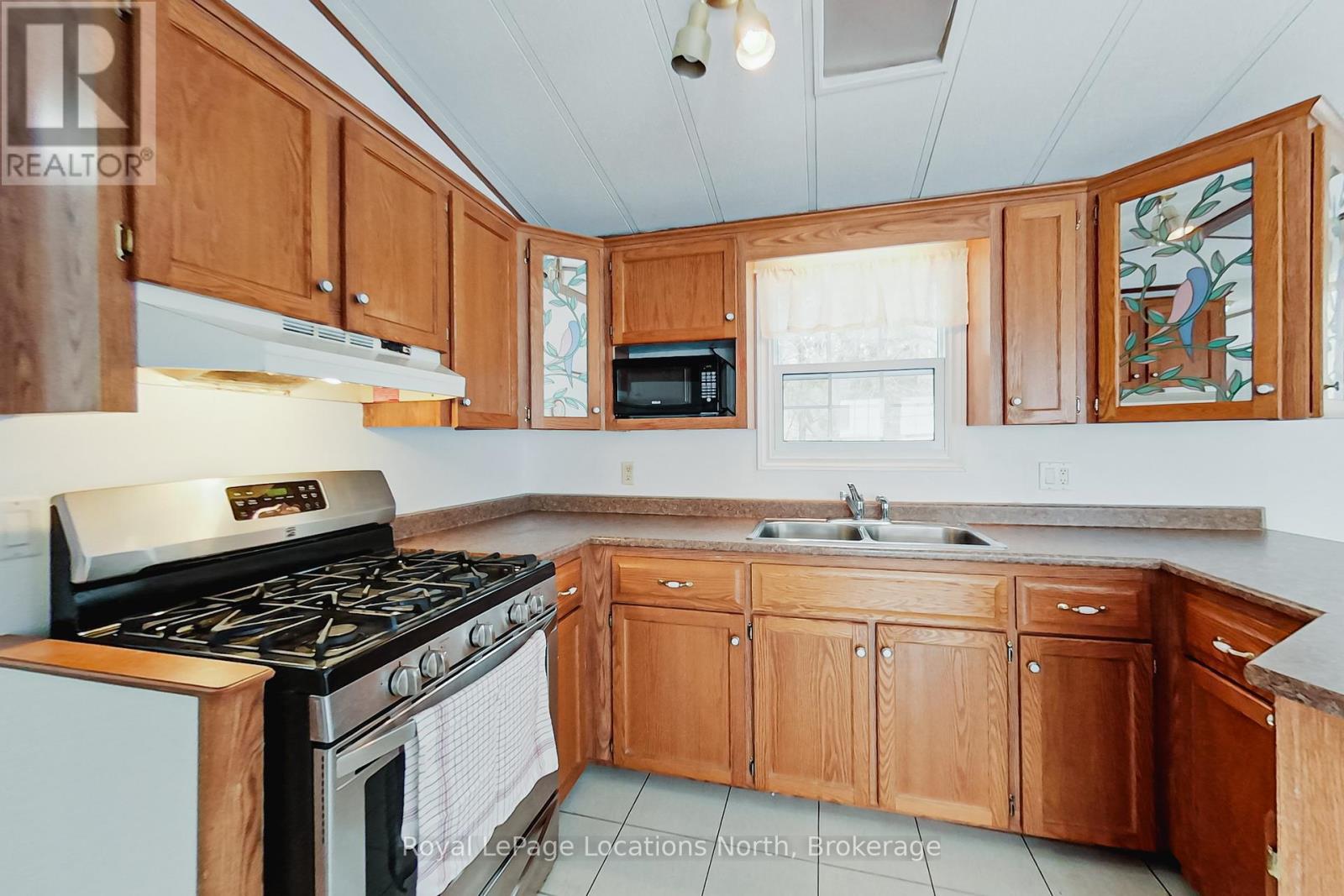 24 Prince Charles Avenue N, Springwater, Ontario  L0L 1P0 - Photo 2 - S12901452