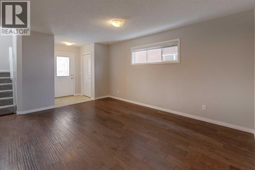 16 Fireside Way, Cochrane, Alberta  T4C 0R1 - Photo 4 - A2280445