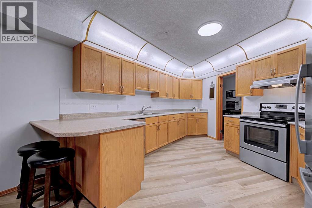 106, 7239 Sierra Morena Boulevard Sw, Calgary, Alberta  T3H 3L7 - Photo 9 - A2294408