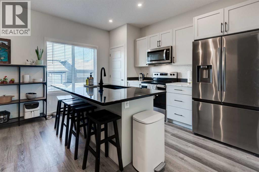 88 Belmont Villas W, Calgary, Alberta  T2X 4W4 - Photo 6 - A2291983