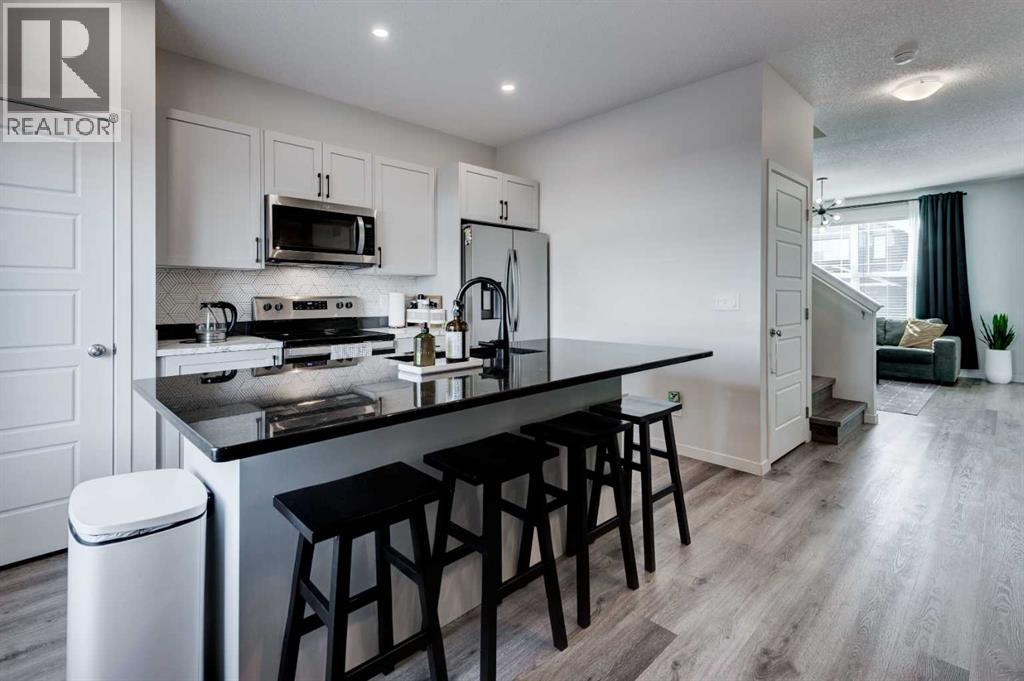 88 Belmont Villas W, Calgary, Alberta  T2X 4W4 - Photo 7 - A2291983