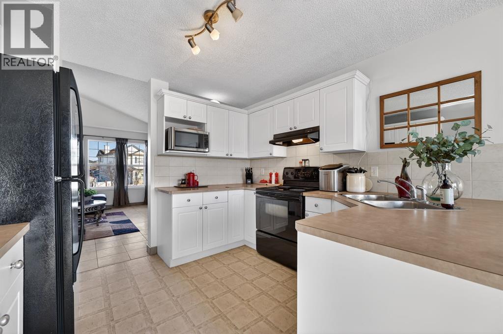 131 Covepark Place NE, Calgary, Alberta  T3K 6A1 - Photo 10 - A2288121